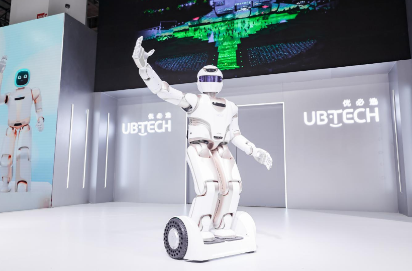 UBTECH Walker humanoid robot exhibition display waving gesture on stage